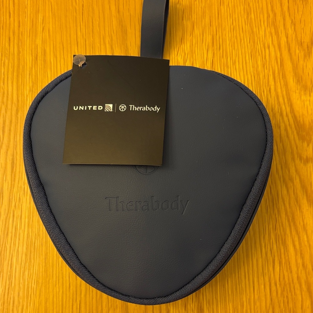 Therabody Navy Carrying Case & Contents - United’s Business Class amenity kit